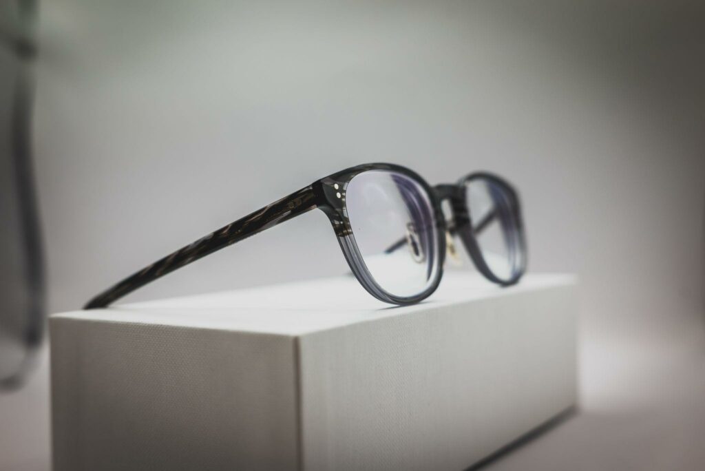 High index glasses resting on a block.